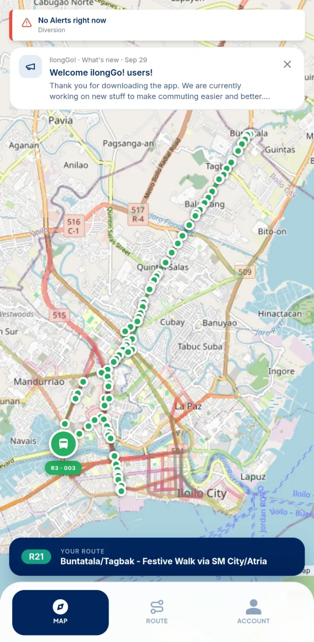 The driver's map in IlongGo!, with the designated stops of the route marked as green dots, the driver's own vehicle, and a banner showing the route being driven